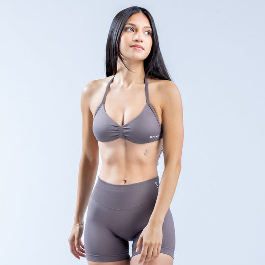 Strappy sports bra with triangle cups and thin adjustable straps in dark gray