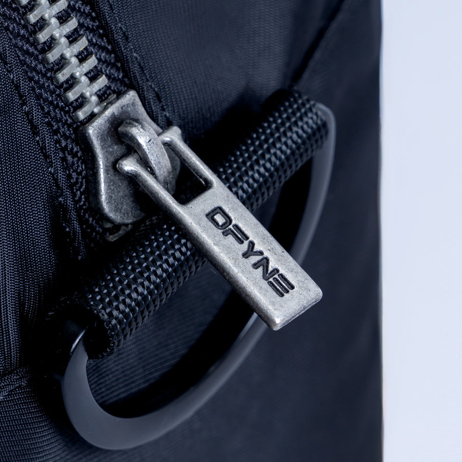 Mini duffle bag metal zipper pull on textured zipper track