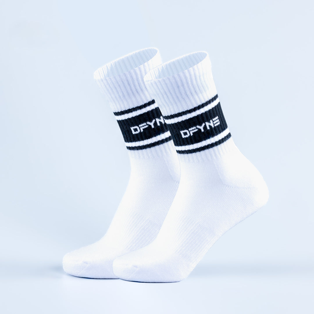 Pair of white crew sports socks with black stripe logo on cuff