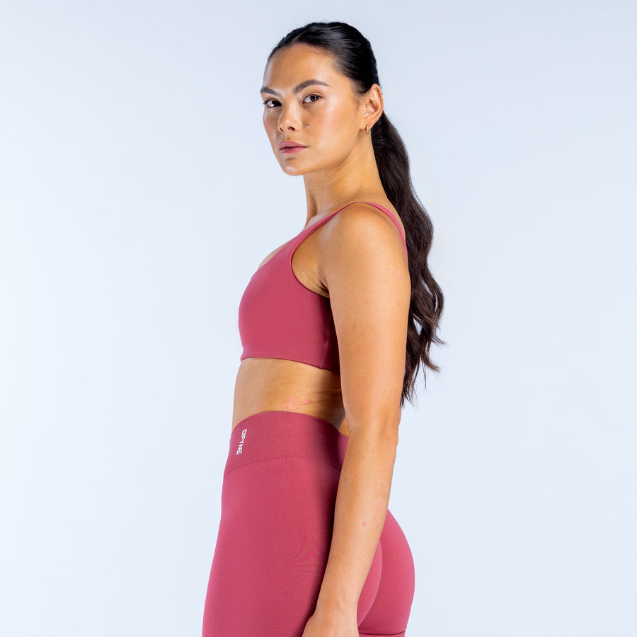 Maroon scoop-back sports bra in side profile