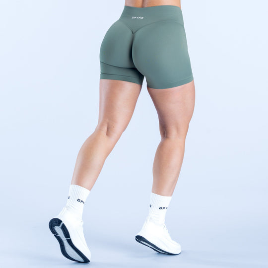 Dark green 4.5-inch athletic shorts with smooth fitted front and back panels