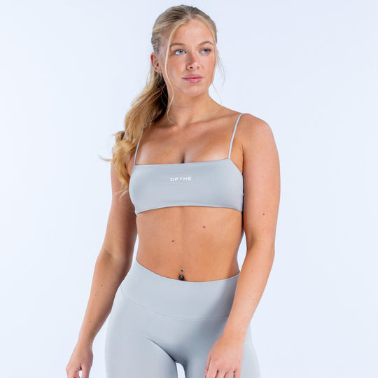 Light blue strappy sports bra with thin straps and smooth underband