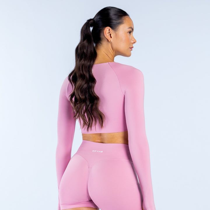 Pink long-sleeve crop top, low back with racerback seam