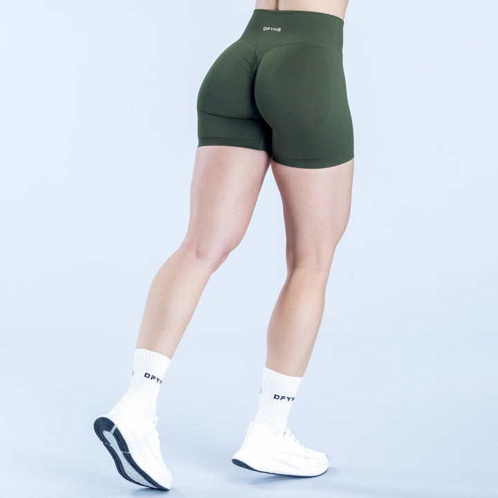 Dynamic 4.5-inch dark green shorts, back view, smooth stretch fit