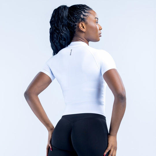 White short-sleeve zip-up top, back view with high collar and seam detailing