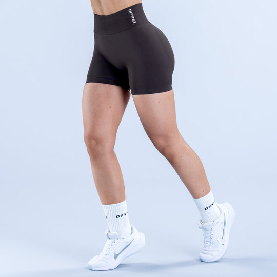 Black 4.5-inch athletic shorts, side view with smooth waistband