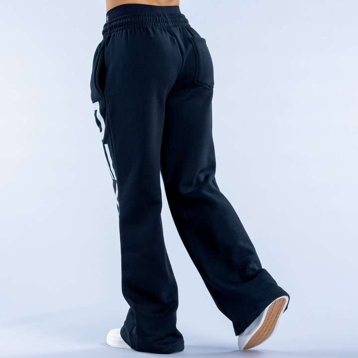 Dark navy wide-leg jogger pants, back view, elastic waistband and relaxed fit