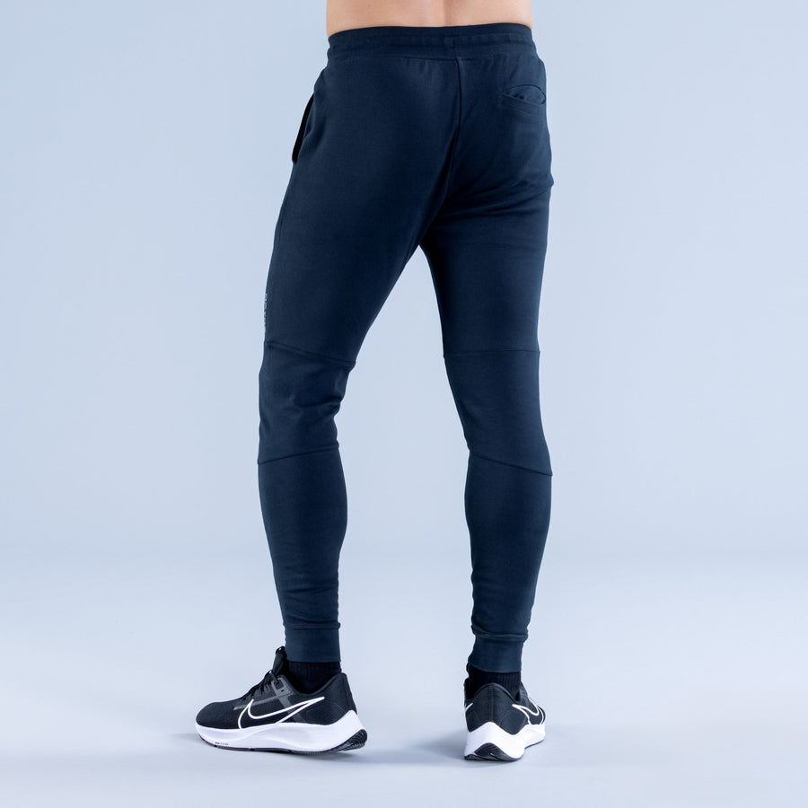 Dark navy tapered jogger pants with side pocket and elastic ankle cuffs