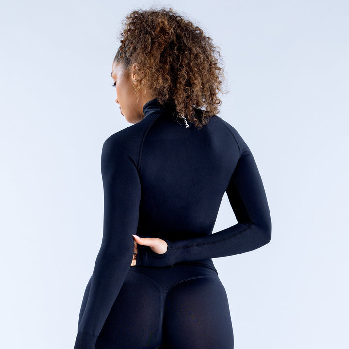 Women's long-sleeve half-zip performance top, dark navy, back view