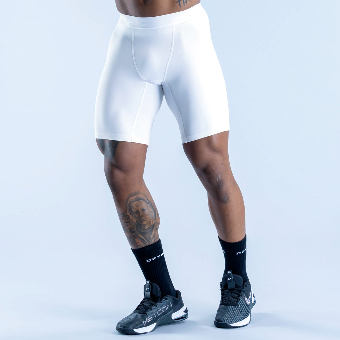 White compression base-layer shorts with flat seams and wide waistband