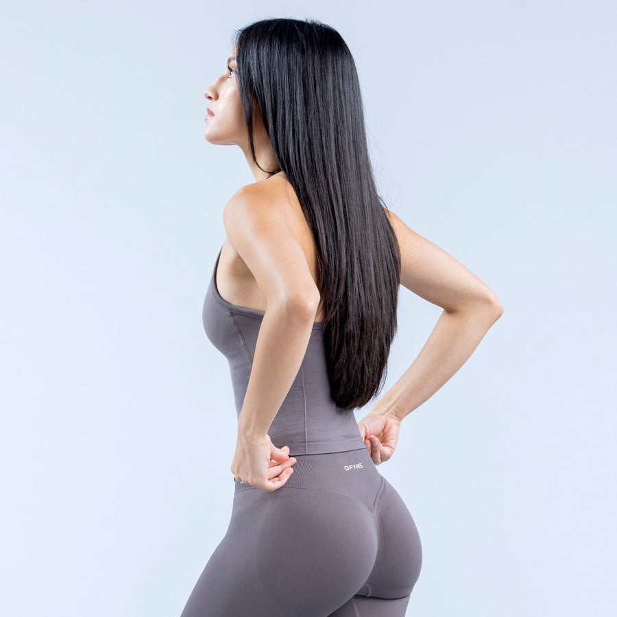 Dark gray longline strappy sports top with curved side seams