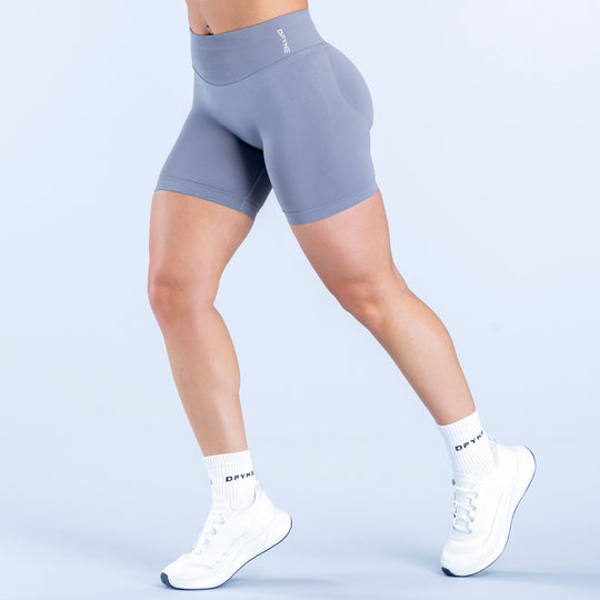 Slate blue 6.5-inch impact biker shorts, high waist, fitted, small side logo