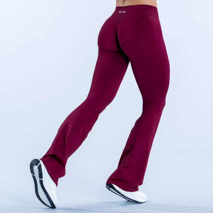 Impact flares in deep burgundy, fitted design with flared leg openings