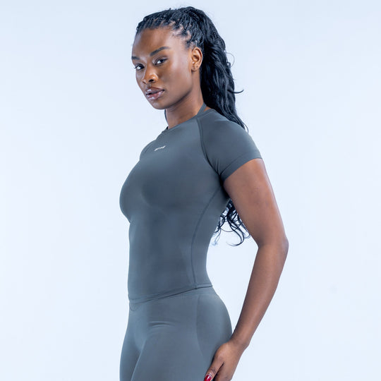 Impact short sleeve top in dark green-gray, front side view with short sleeves