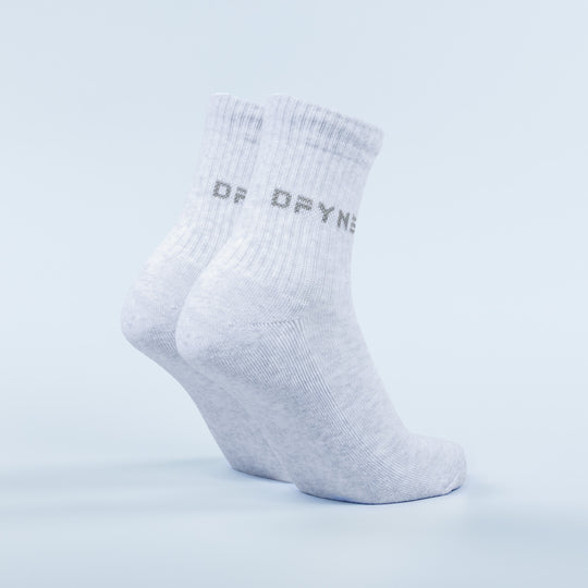 Light blue ribbed quarter socks showing side logo and cushioned sole, pair