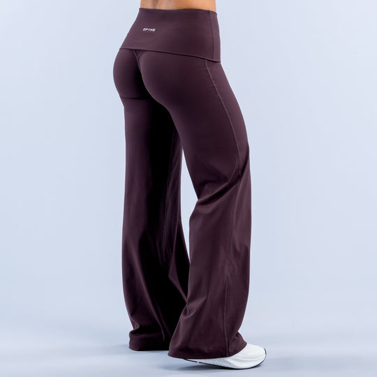 Purple fold-over wide-leg pants with high waistband and full-length wide flare