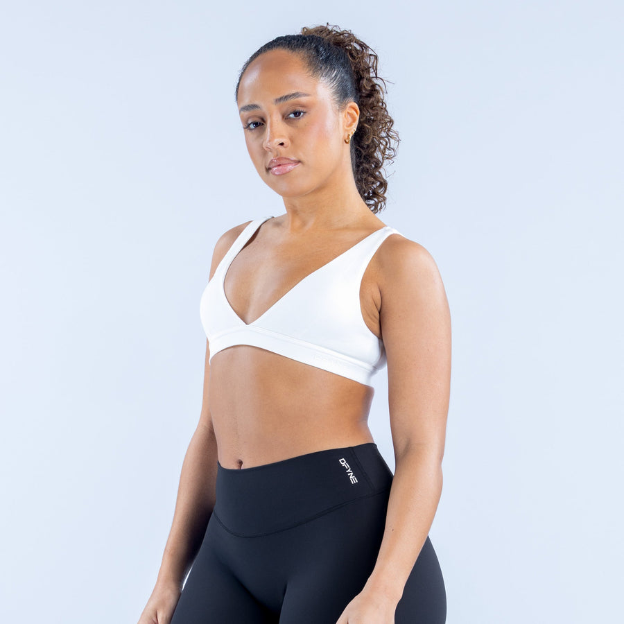 White minimal V-neck sports bra with smooth underband