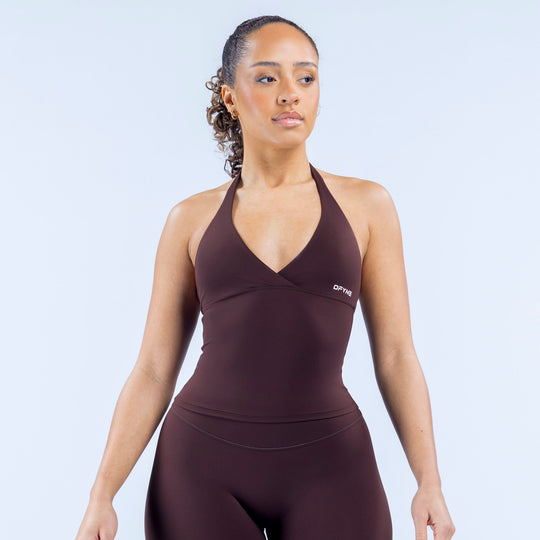 Dark maroon halter-neck top with V neckline, fitted stretch design