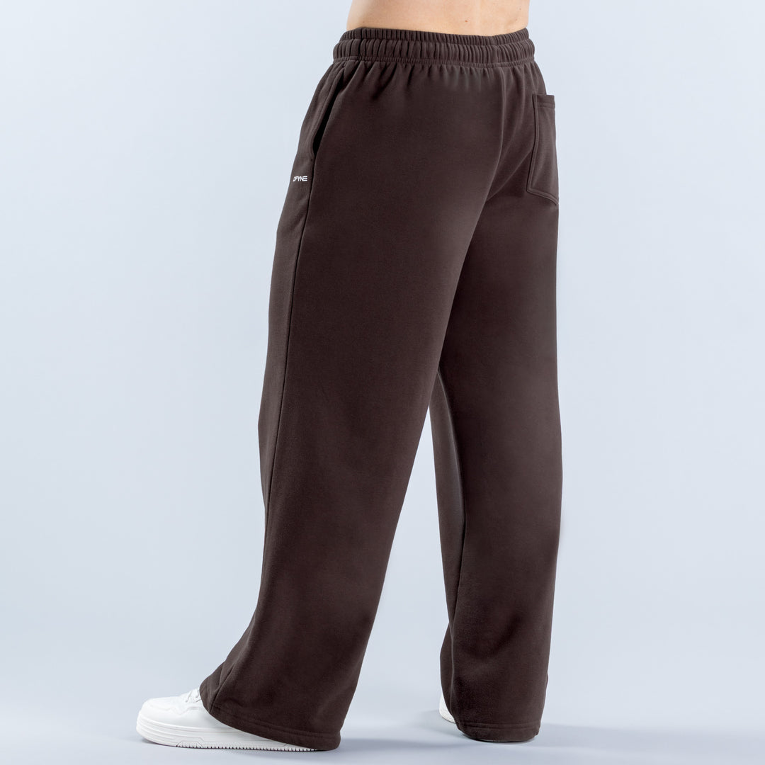 Dark brown joggers shown from the side, with a relaxed straight-leg fit