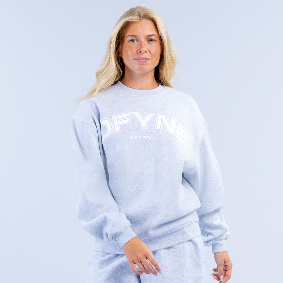 Light blue graphic sweatshirt with DEFYN logo and crew neck