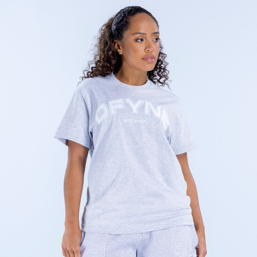 Light gray oversized graphic T-shirt with crew neck and short sleeves, front logo