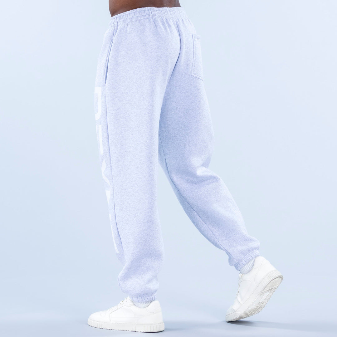 Light blue cuffed jogger pants with side logo graphic and tapered leg