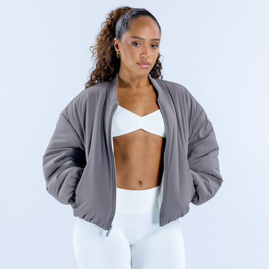 Reversible bomber jacket in dark gray with front zipper and ribbed cuffs